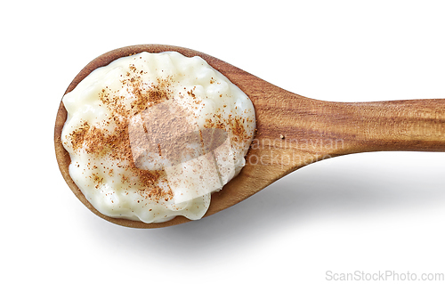 Image of wooden spoon of rice pudding