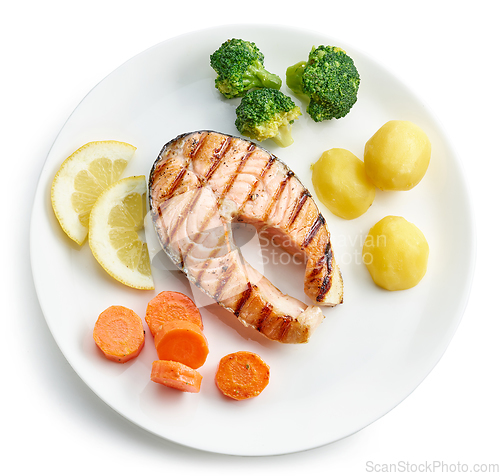 Image of plate of grilled salmon steak and vegetables