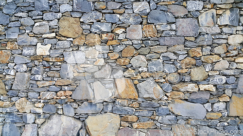 Image of Old wall from stones of various shapes