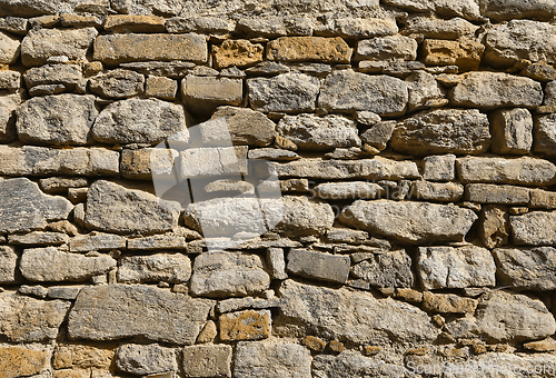 Image of Texture of an old wall of stones and bricks