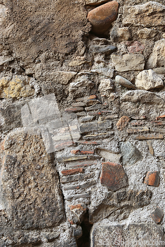 Image of Texture of an old wall of stones and bricks