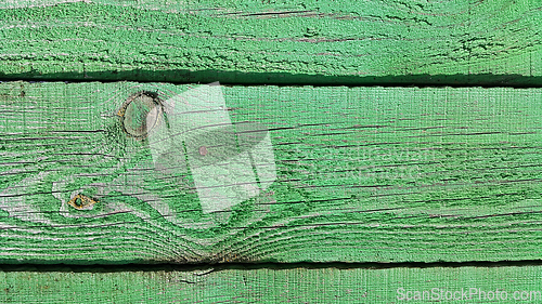 Image of Texture of weathered wooden green painted fence