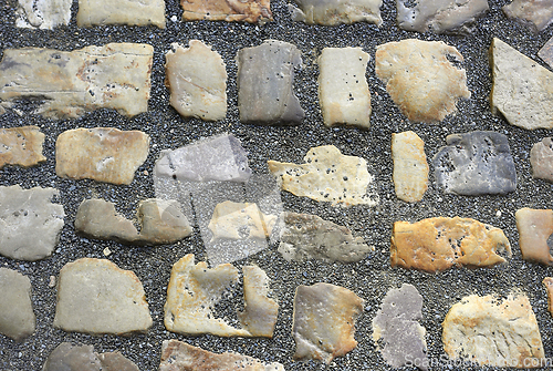 Image of Paving stones road with gravel