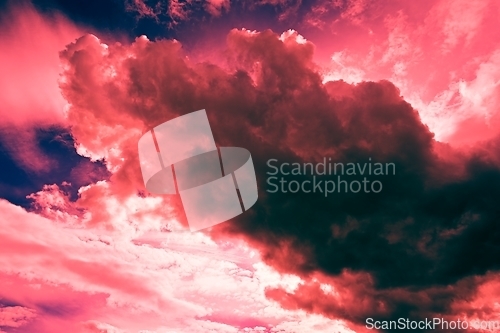 Image of purple clouds in the dark sky