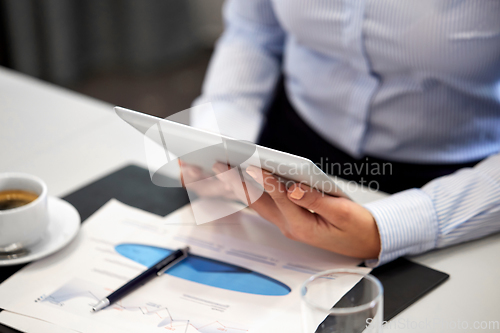 Image of businesswoman with tablet pc computer at office