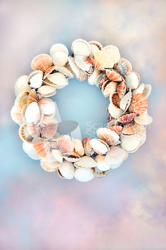 Image of Scallop Seashell Wreath on Heavenly Sky Background