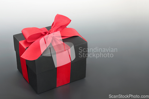 Image of Black Gift Box with Red Bow  