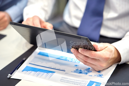 Image of businessman with tablet pc computer at office