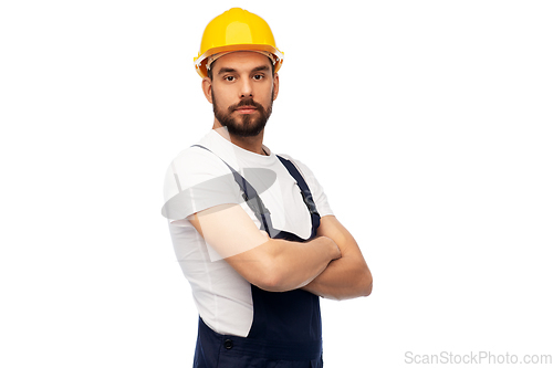 Image of male worker or builder with crossed arms