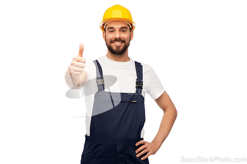 Image of male worker or builder showing thumbs up