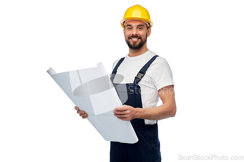 Image of male worker or builder in helmet with blueprint