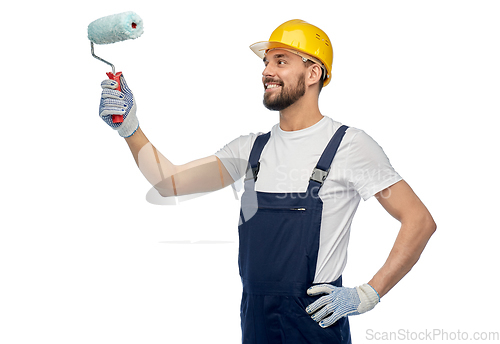 Image of male worker or builder with paint roller