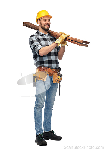 Image of happy male worker or builder in helmet with boards