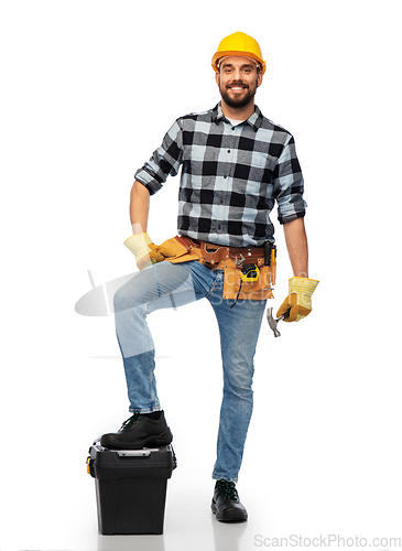 Image of happy worker or builder in helmet with tool box