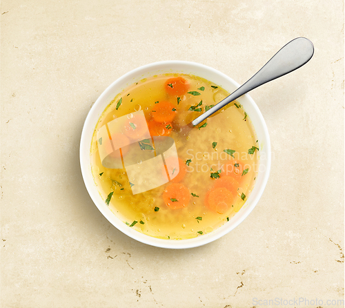 Image of bowl of chicken broth soup