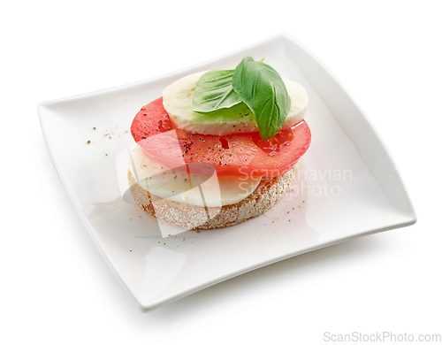 Image of bruschetta with tomato and mozzarella