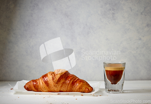 Image of croissant and espresso coffee