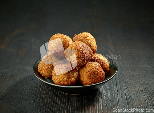 Image of bowl of fried falafel balls