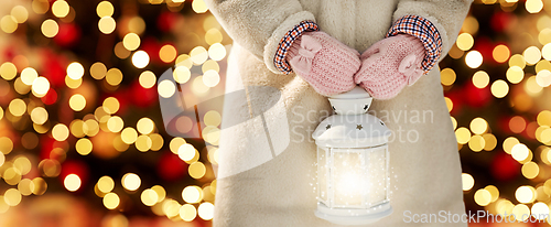 Image of close up of girl with magical christmas lantern