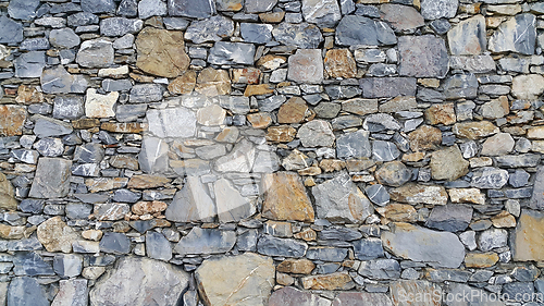 Image of Old wall from stones of various shapes
