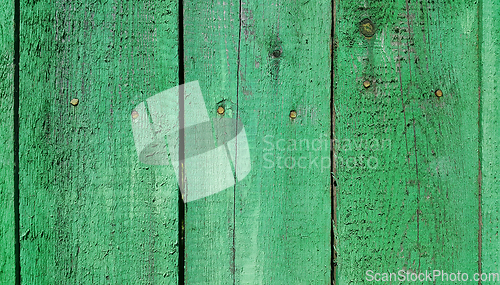 Image of Texture of weathered wooden green painted fence