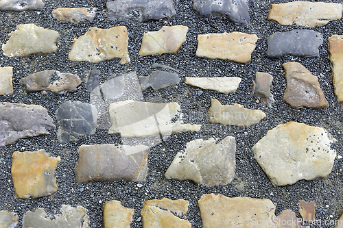 Image of Paving stones road with gravel