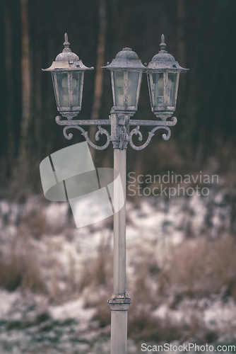 Image of Vintage outdoor lamp with three lanterns