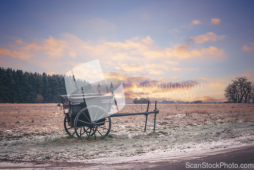 Image of Old settlers wagon standing in the frost