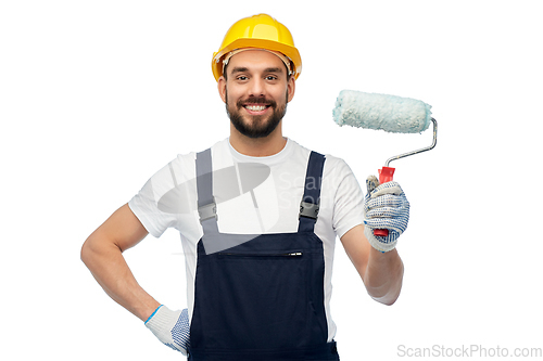 Image of male worker or builder with paint roller