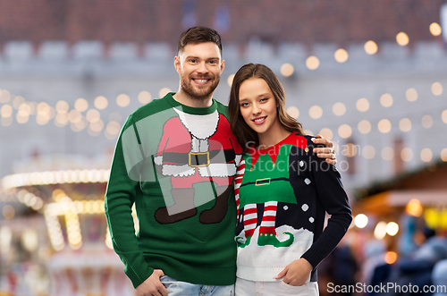 Image of happy couple at christmas market