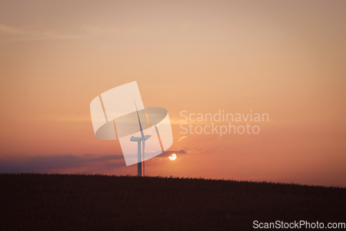 Image of Windmill in the sunset on a hill