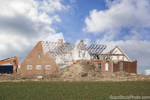 Image of House demolition in rural surroundings