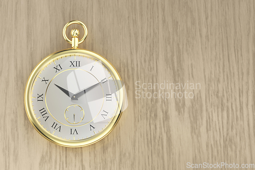 Image of Shiny golden pocket watch