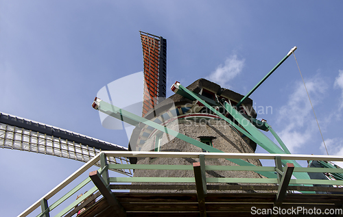 Image of Old windmill in Zaan Schans countryside close to Amsterdam