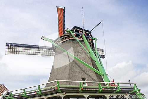 Image of Old windmill in Zaan Schans countryside close to Amsterdam