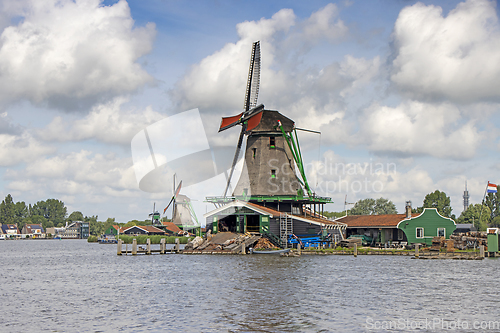 Image of Old windmill in Zaan Schans countryside close to Amsterdam