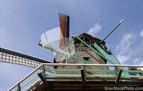 Image of Old windmill in Zaan Schans countryside close to Amsterdam