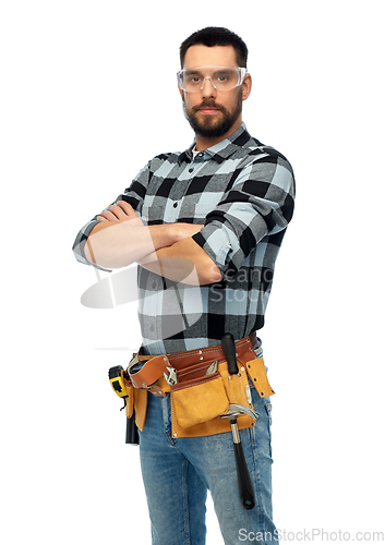 Image of happy male worker or builder with crossed arms