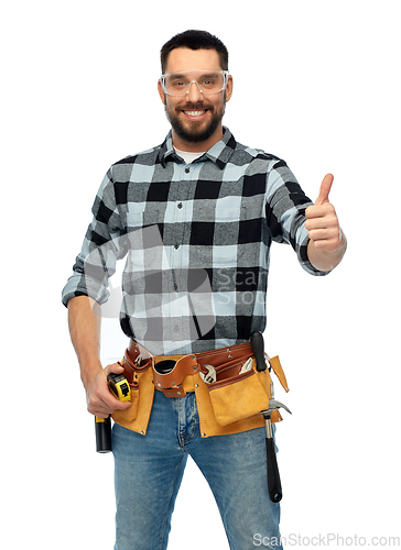 Image of happy male worker or builder with tool belt