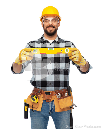 Image of happy male worker or builder in helmet with level