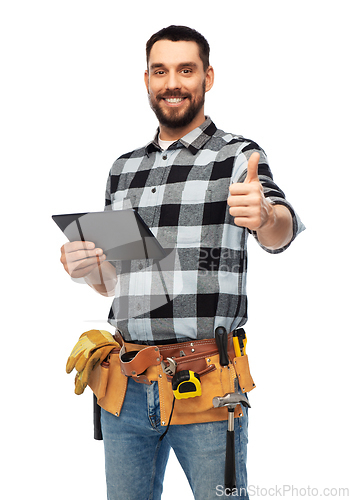 Image of happy builder with tablet computer and tools