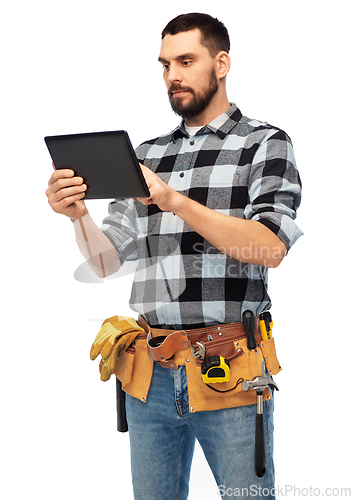 Image of builder with tablet computer and tools