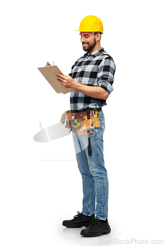 Image of male worker or builder in helmet with clipboard