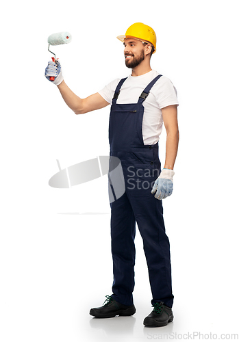 Image of male worker or builder with paint roller