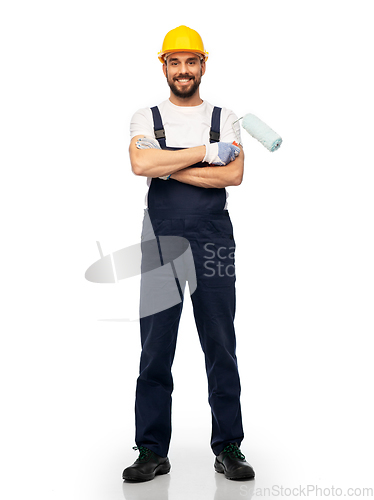 Image of male worker or builder with paint roller