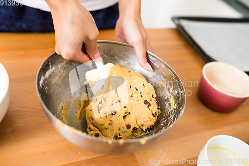 Image of Stirring the paste in bowl