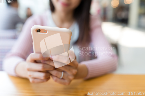 Image of Woman use of mobile phone