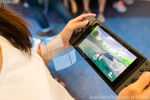 Image of Hong Kong, 19 May 2017 -:Playing mario kart 8 on Nintendo Switch