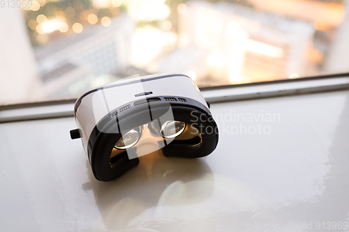Image of Virtual reality device playing music video inside
