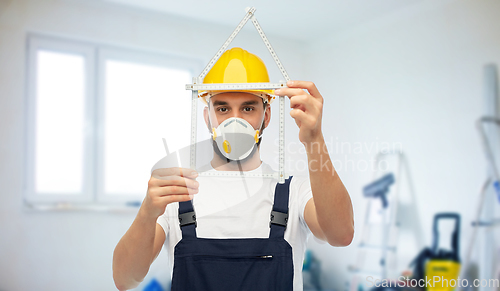 Image of male worker or builder with carpenter's rule